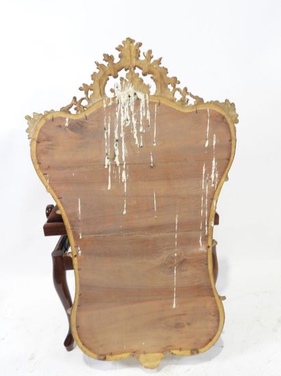 Wood and gilded stucco mirror with Rocaille...