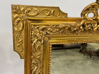 Rectangular wood and stucco mirror with rows...