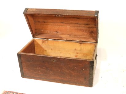 Patinated wood trunk with blackened iron...