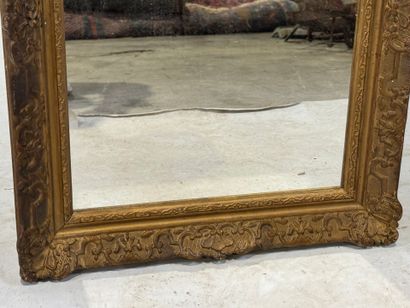 Rectangular mirror in wood and gilded stucco,...