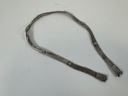 Probably a foreign silver belt decorated...