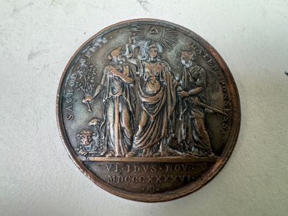 Lot of 9 bronze and silver medals.
19th century.
D....