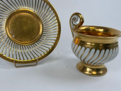 Large cup and saucer in white and gold porcelain,...