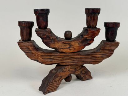 Four-arm candlestick in wood. 
Brutalist...