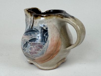 Enameled stoneware pitcher with polychrome...