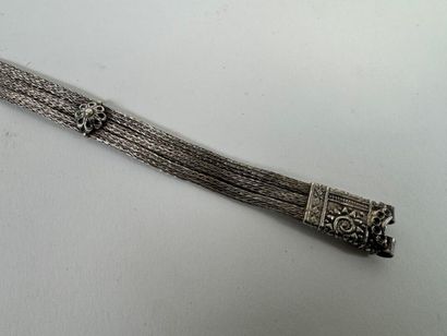 Probably a foreign silver belt decorated...