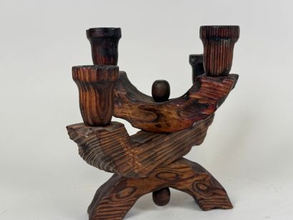 Four-arm candlestick in wood. 
Brutalist...