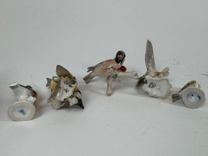 Collection of five polychrome porcelain subjects,...