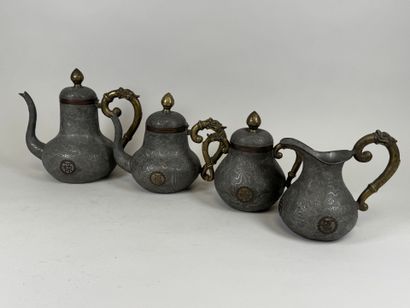 ASIA, 20th century.
Pewter and gilt bronze...