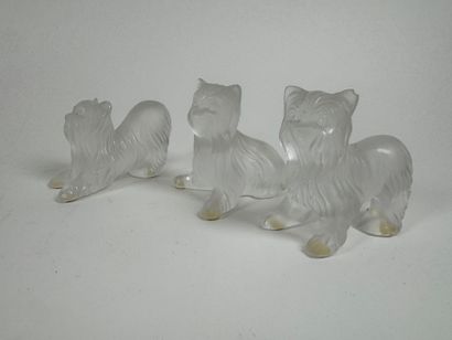 LALIQUE France.
Dogs.
Three subjects in molded,...