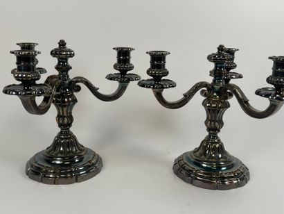 Pair of silver-plated three-light metal torches.
H....