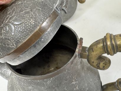 ASIA, 20th century.
Pewter and gilt bronze...