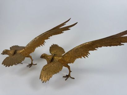Pair of gilded and chased metal figures of...