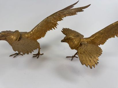 Pair of gilded and chased metal figures of...