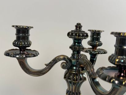 Pair of silver-plated three-light metal torches.
H....