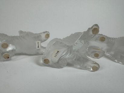 LALIQUE France.
Dogs.
Three subjects in molded,...
