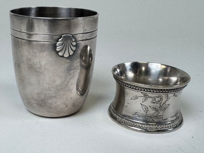 ERCUIS
Silver-plated shell-shaped tumbler....