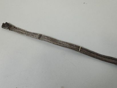 Probably a foreign silver belt decorated...