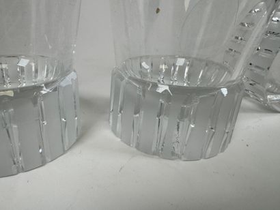 Lot including:
- Yves Saint Laurent. 
Three...