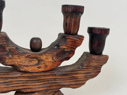 Four-arm candlestick in wood. 
Brutalist...