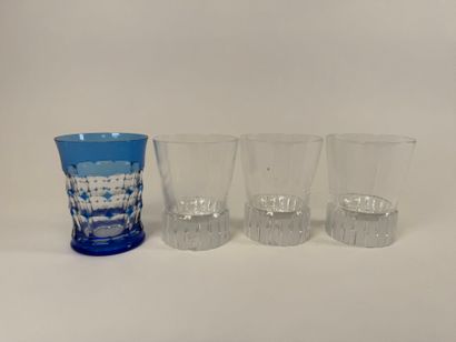 Lot including:
- Yves Saint Laurent. 
Three...