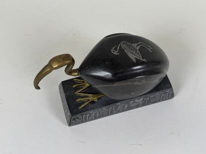 Ibis in hard stone and brass, the base decorated...