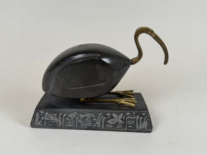 Ibis in hard stone and brass, the base decorated...