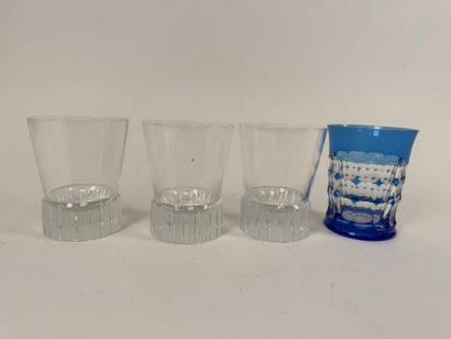 Lot including:
- Yves Saint Laurent. 
Three...