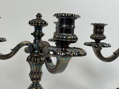 Pair of silver-plated three-light metal torches.
H....