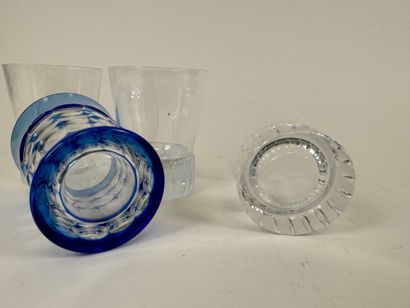 Lot including:
- Yves Saint Laurent. 
Three...