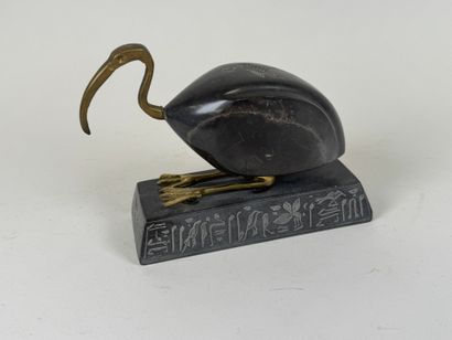 Ibis in hard stone and brass, the base decorated...