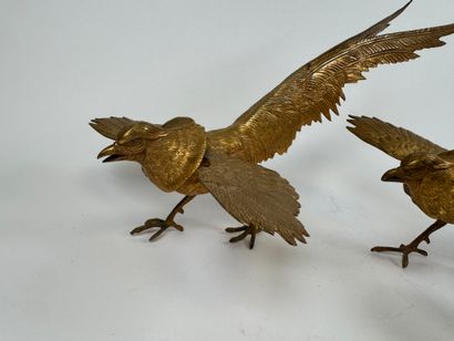 Pair of gilded and chased metal figures of...