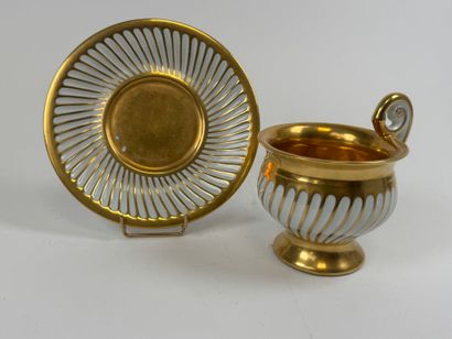 Large cup and saucer in white and gold porcelain,...