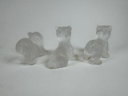 LALIQUE France.
Dogs.
Three subjects in molded,...