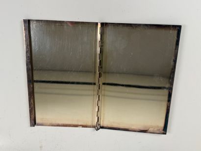 Two silver-plated picture frames decorated...