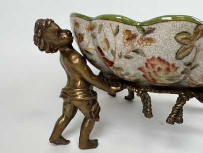 Polychrome ceramic bowl decorated with foliage,...