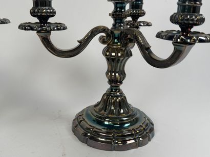 Pair of silver-plated three-light metal torches.
H....