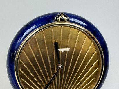 CARTIER.
Pendulette circulaire à quartz en...