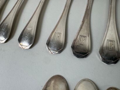 Émile PUIFORCAT.
Partie de ménagère en argent...