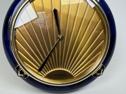 CARTIER.
Pendulette circulaire à quartz en...
