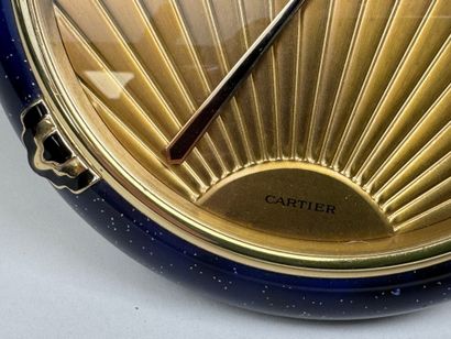 CARTIER.
Pendulette circulaire à quartz en...