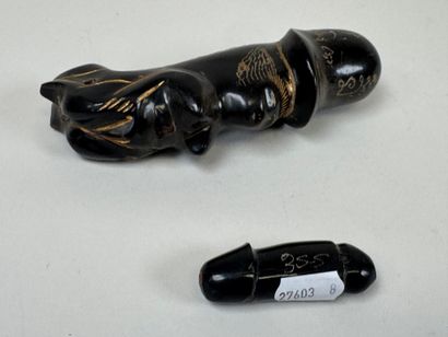 ASIA, 20th century.
Set of two carved horn...