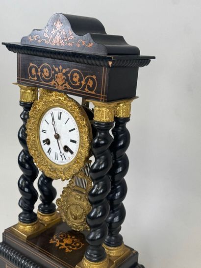 Portico clock in blackened wood, the base...