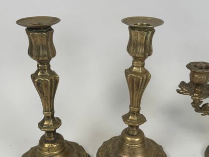 Pair of bronze candlesticks, scalloped base.
19th...