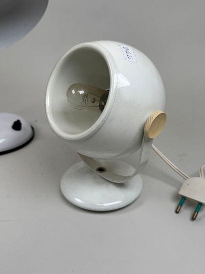 Two plastic and white metal lamps, one hinged.
20th...
