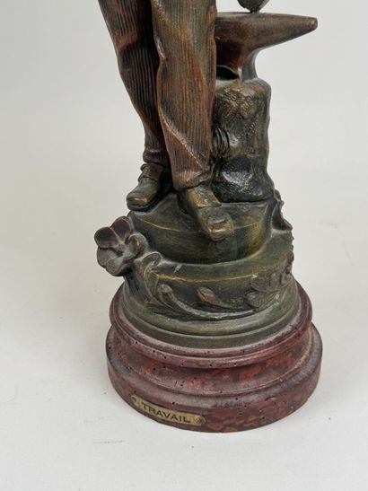 Le Travail. 
Large patinated bronze subject...