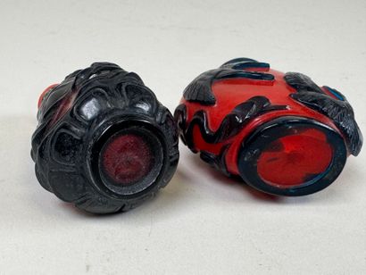 ASIA, 20th century.
Two glass snuffboxes...