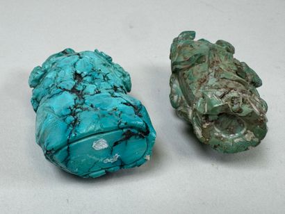ASIA, 20th century.
Two carved turquoise...