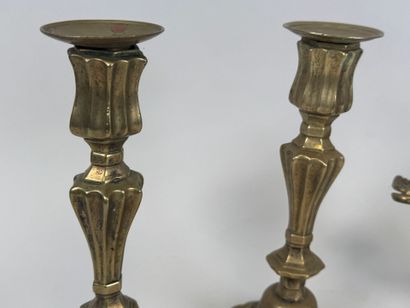 Pair of bronze candlesticks, scalloped base.
19th...