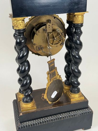 Portico clock in blackened wood, the base...